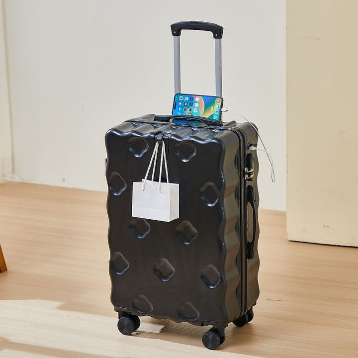 hard-shell carry-on suitcase with integrated foldable cup holder phone cradle USB charging port and external bag hooks Stornfield