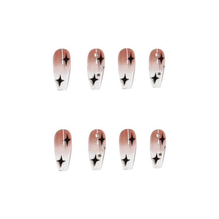 Trendy artificial nails with star design Stornfield