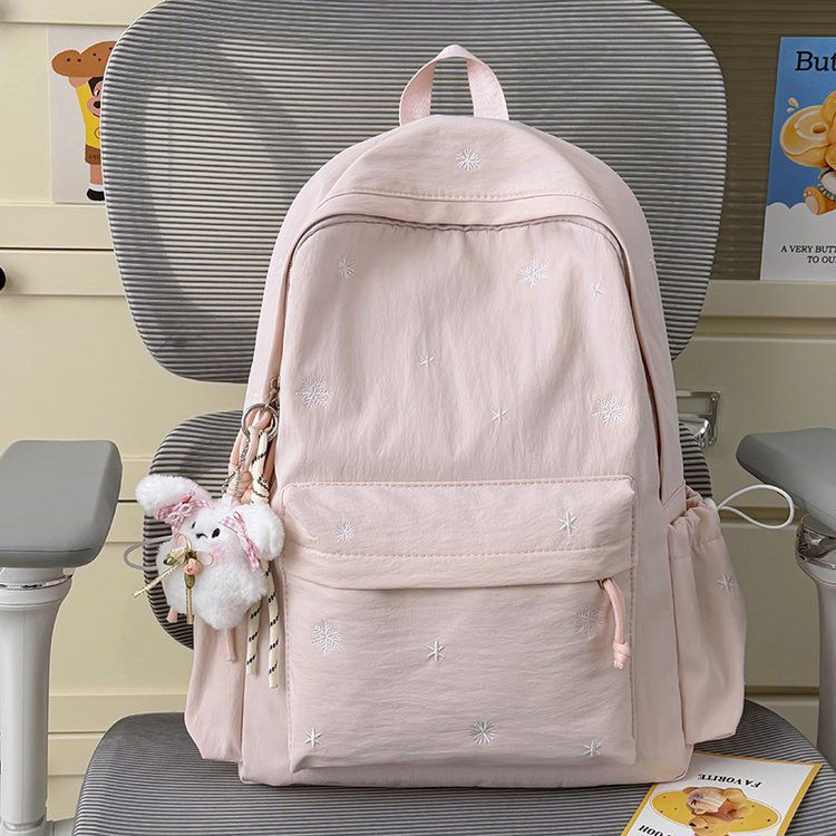 Playful backpack with fine embroidery Stornfield