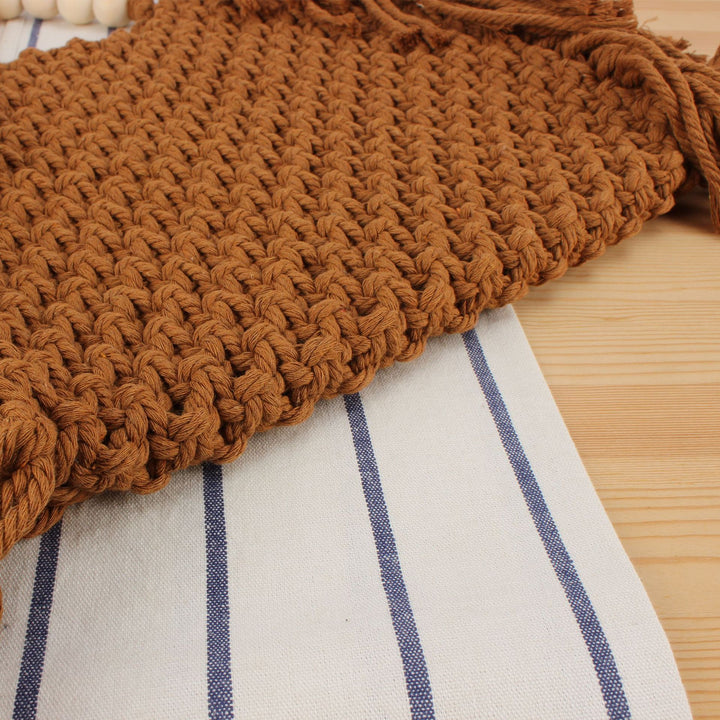 Creative crochet handbag with decorative fringes Stornfield