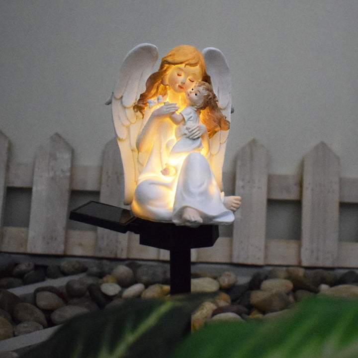 Decorative Solar Garden Stake Statue Resin Girl Figurine With Integrated Solar LED And Weatherproof Spike Stornfield