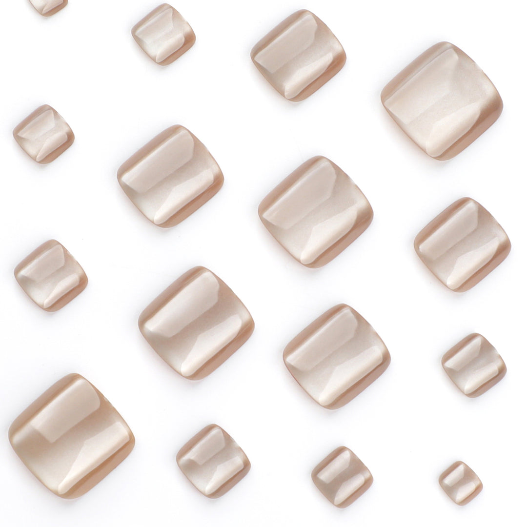 Artful toenail design with glossy accents Stornfield