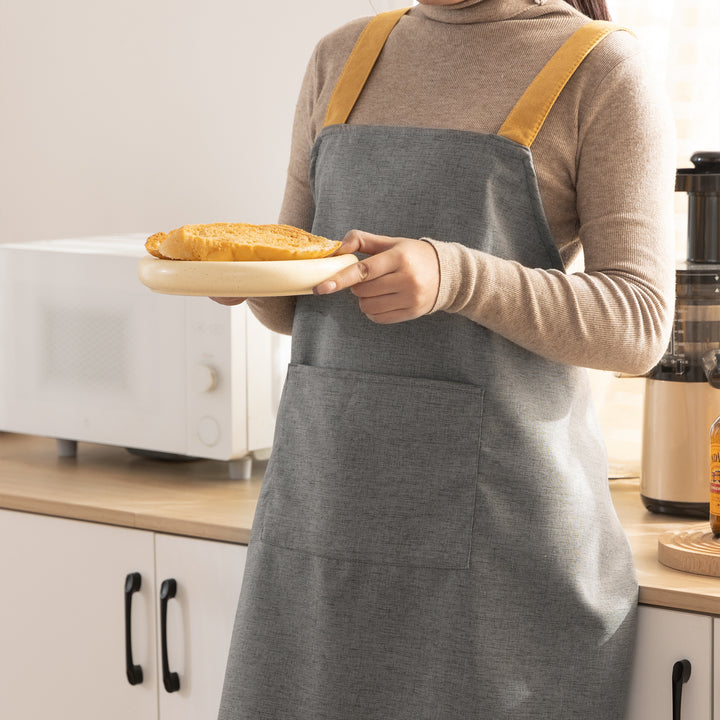 Adjustable canvas apron with wide contrast straps and applied front pocket Stornfield