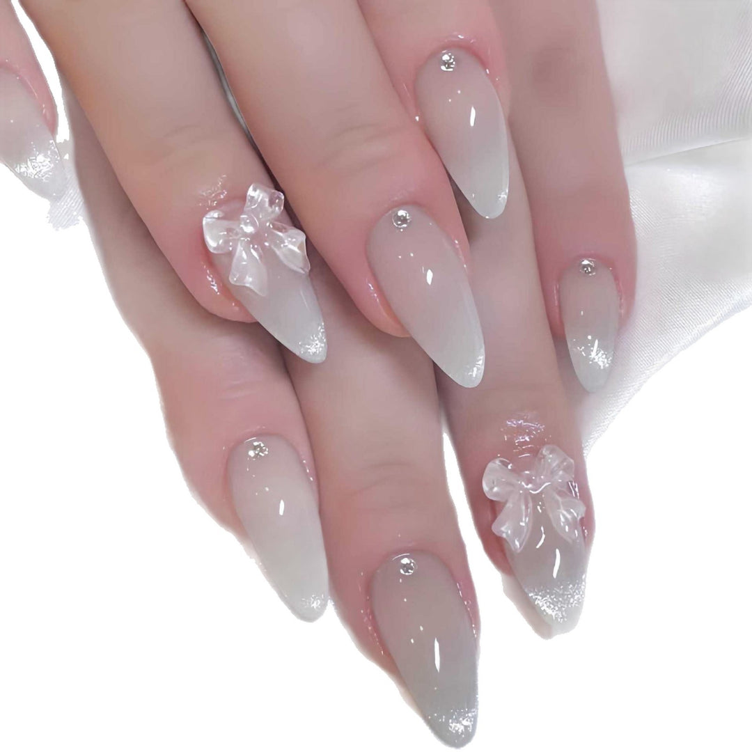 Elegant Stiletto-Shaped Press-On Nails with Decorative Bow Accents Stornfield