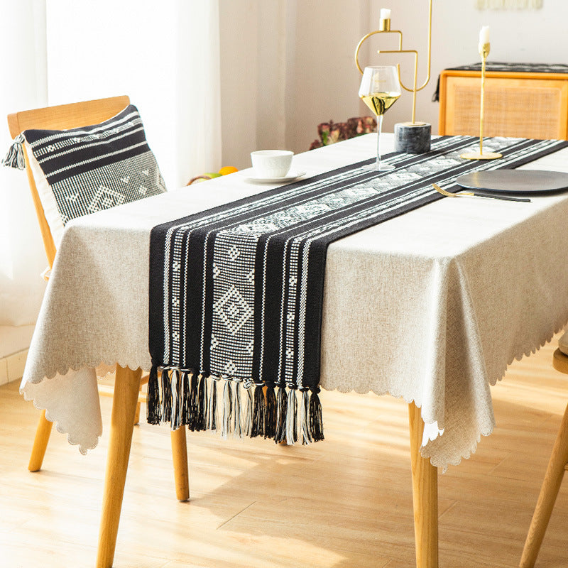 Handwoven table runner made of cotton blend with fringes and geometric dot jacquard Stornfield