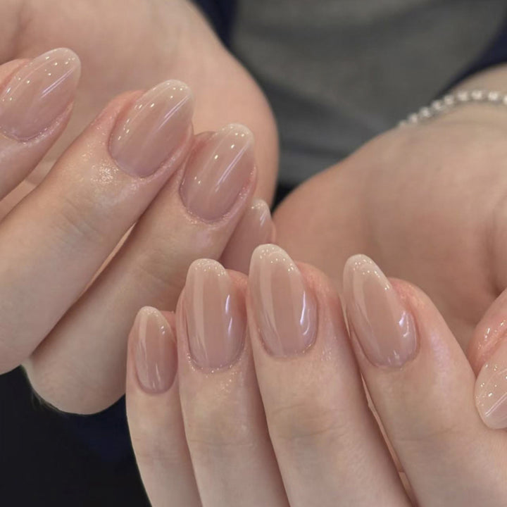Artificial nail art with playful dots and bows Stornfield