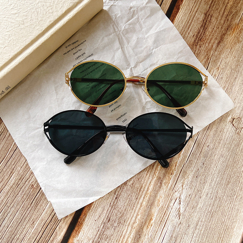 Round Sunglasses with Golden Accents Stornfield