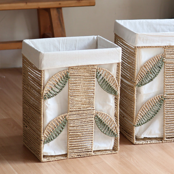 Elegant laundry basket made of natural wicker with fabric lining Stornfield
