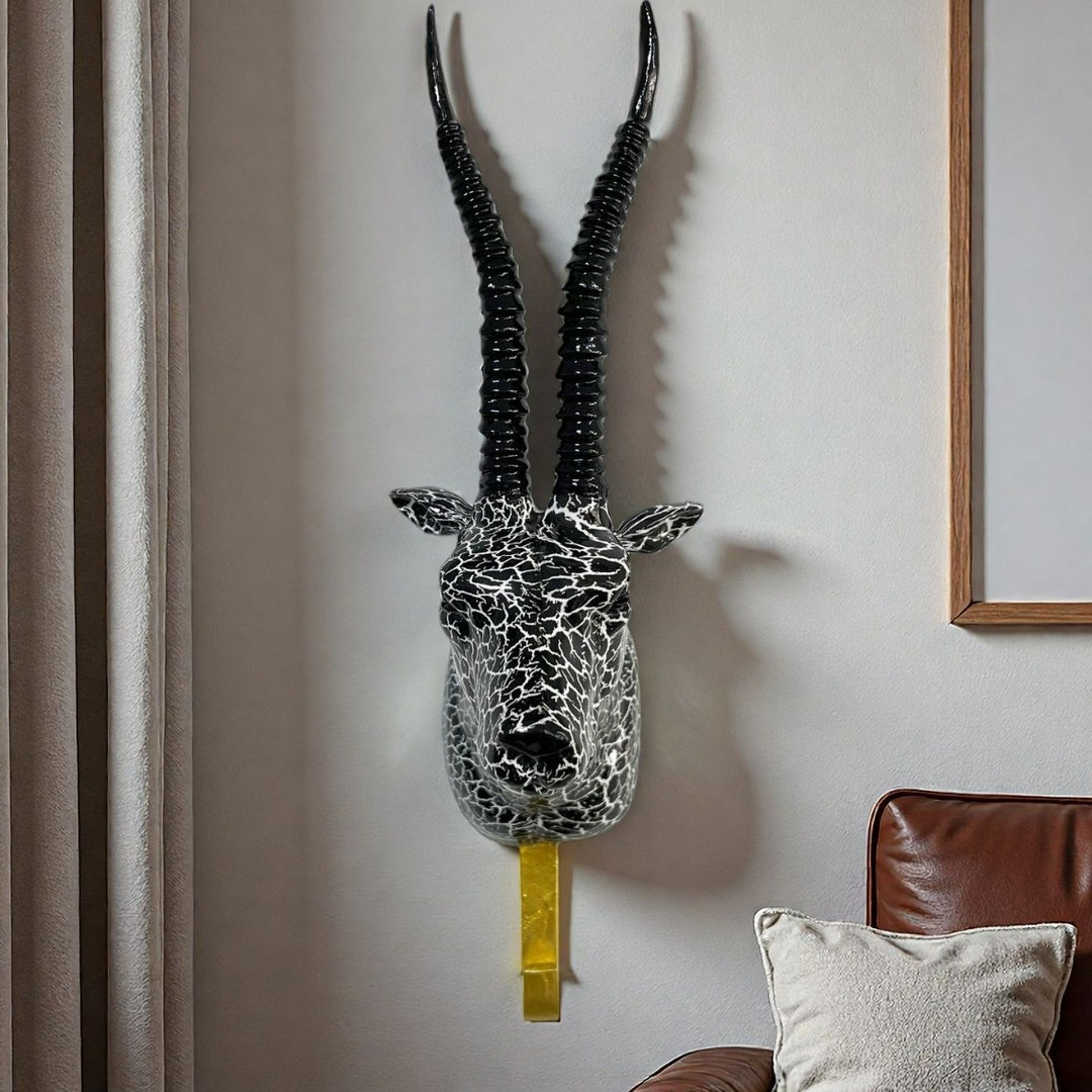 Wall hooks in the shape of a stylized unicorn Stornfield