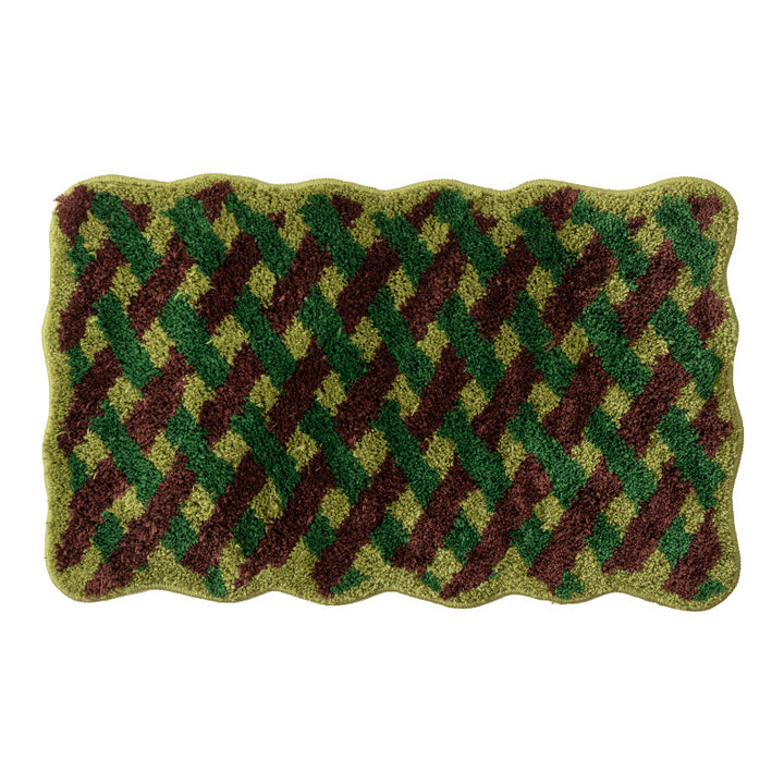 Tufted bathroom runner with wavy hem and relief-style braided pattern Stornfield
