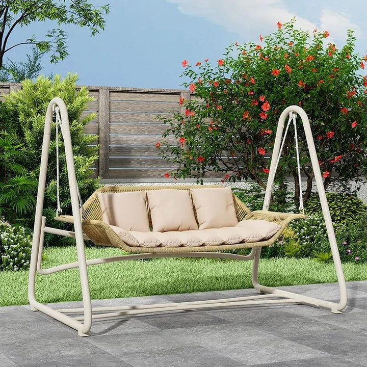 Woven rattan outdoor swing loveseat with padded cushions and powder-coated steel frame Stornfield