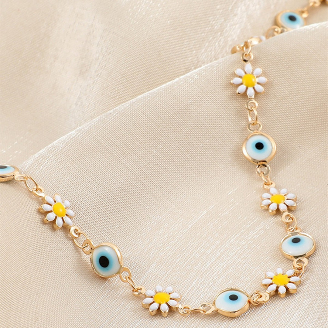 Flower and Eye Charm Bracelet Stornfield
