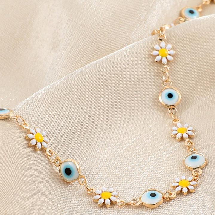 Flower and Eye Charm Bracelet Stornfield