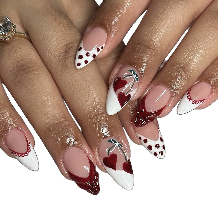Creative nail art set with romantic heart design and playful accents Stornfield