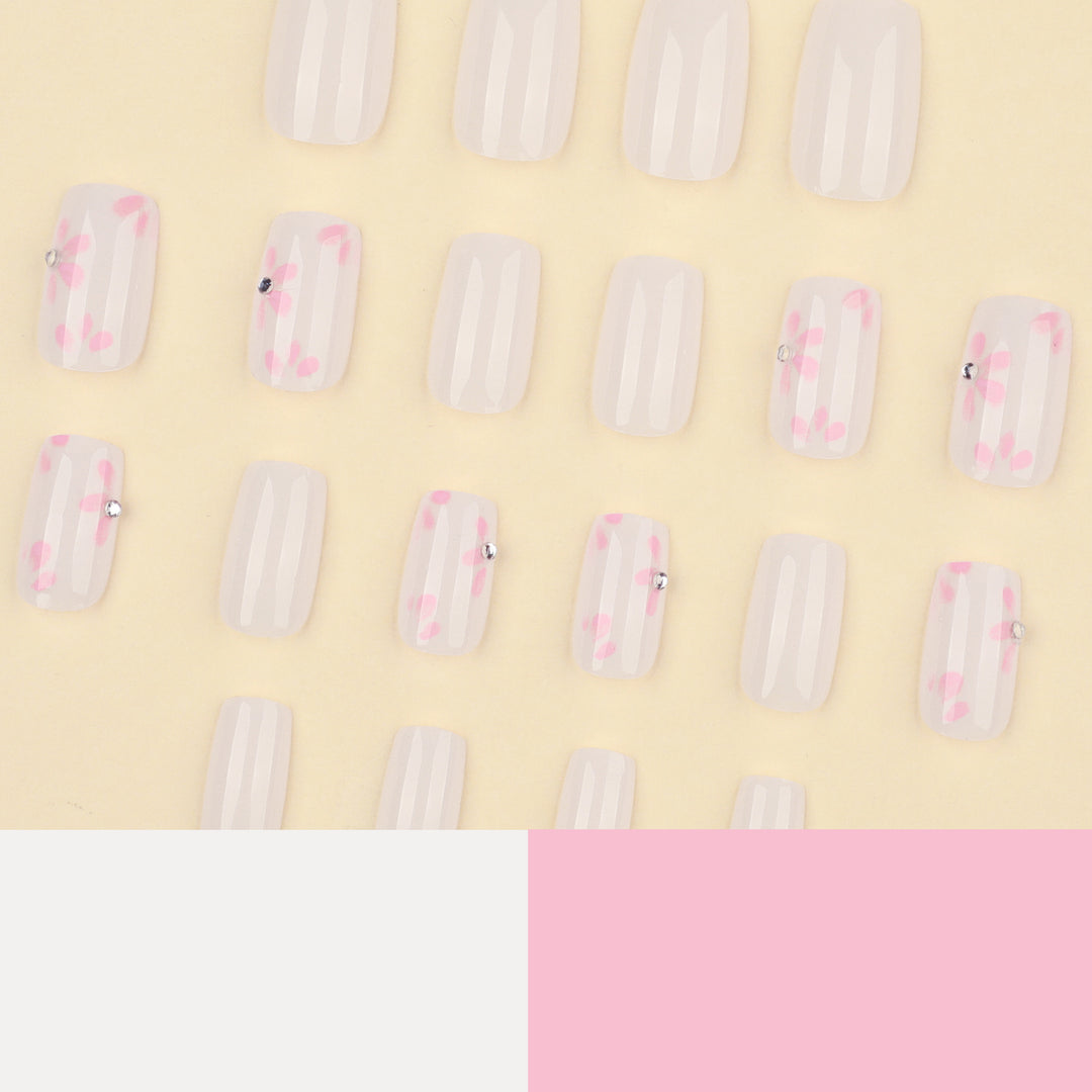 Artful Nail Art with Delicate Flower Patterns Stornfield