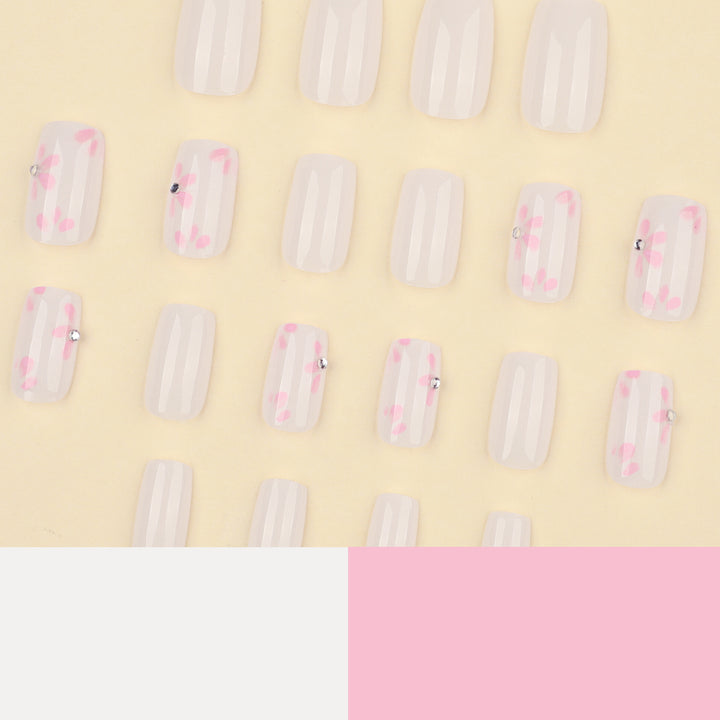 Artful Nail Art with Delicate Flower Patterns Stornfield
