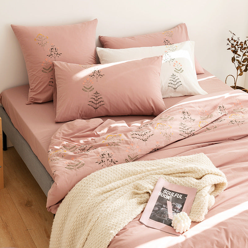 Embroidered cotton muslin bedding set with delicate flower appliqués and extra soft fitted sheet