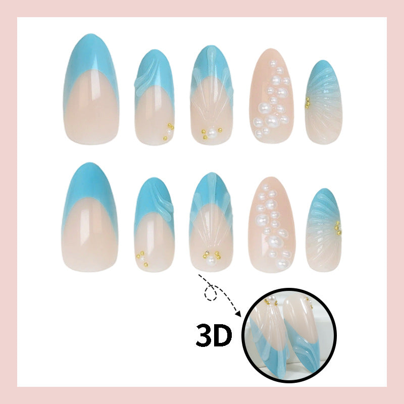 Art nail set with elegant shell and pearl decorations Stornfield