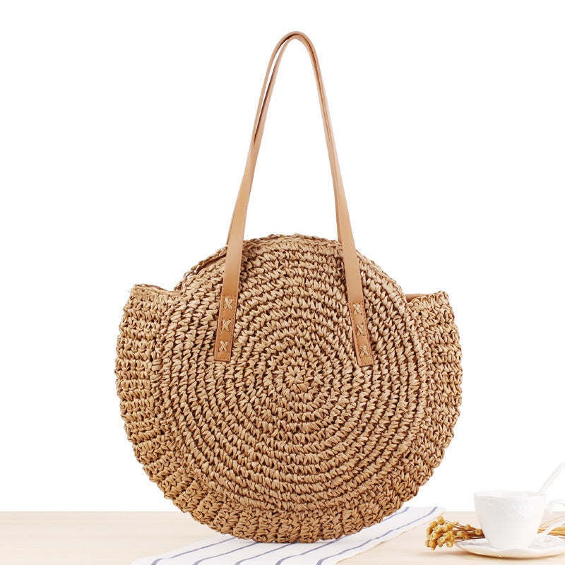 Round straw bag with leather handles Stornfield