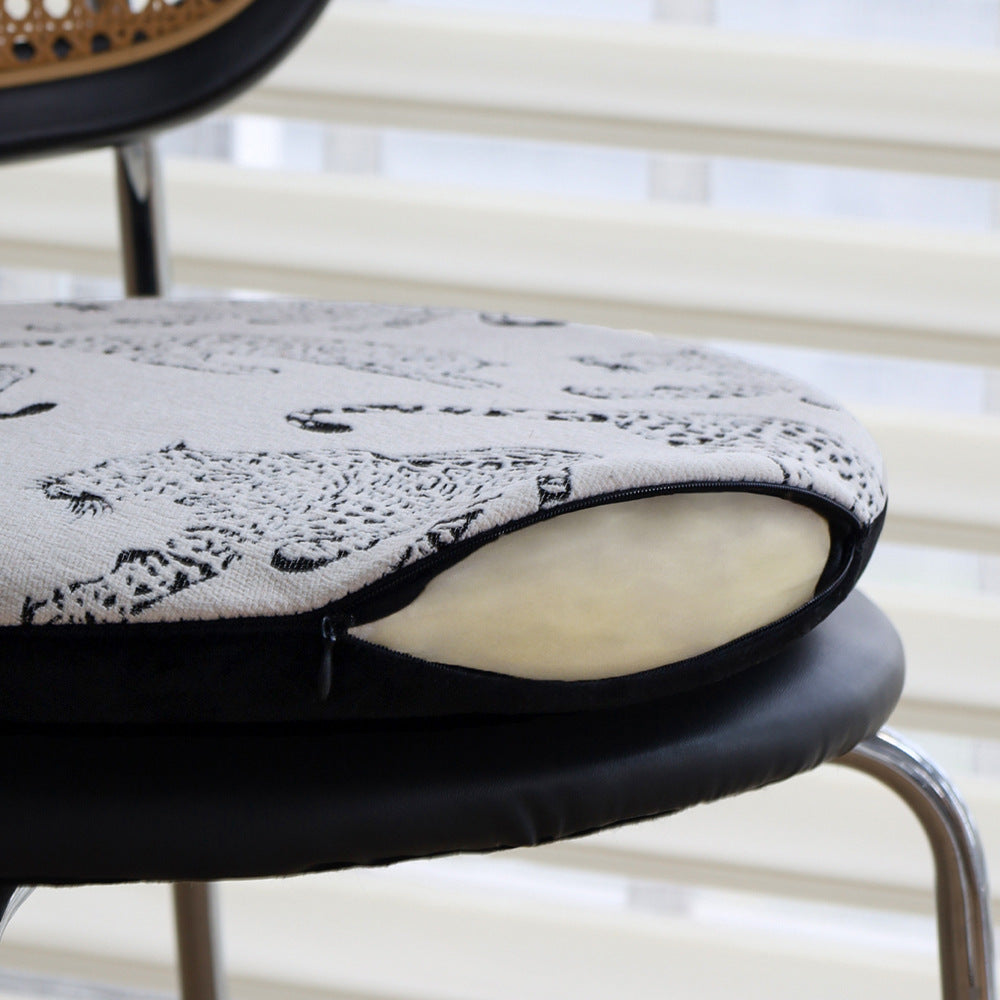 Round seat cushion with decorative animal print and non-slip underside Stornfield
