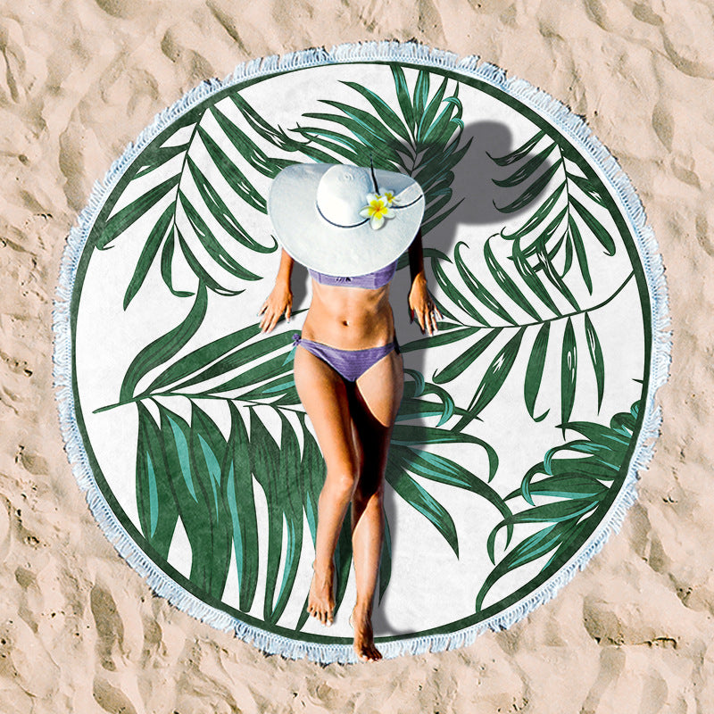 Round beach towel with vibrant tropical pattern Stornfield