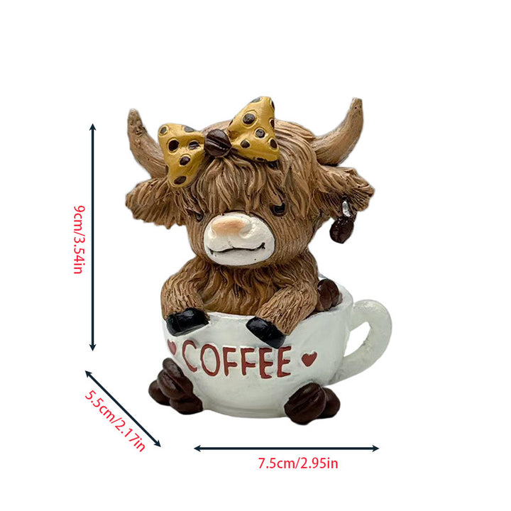Decorative figure of a Highland cow with accessories Stornfield
