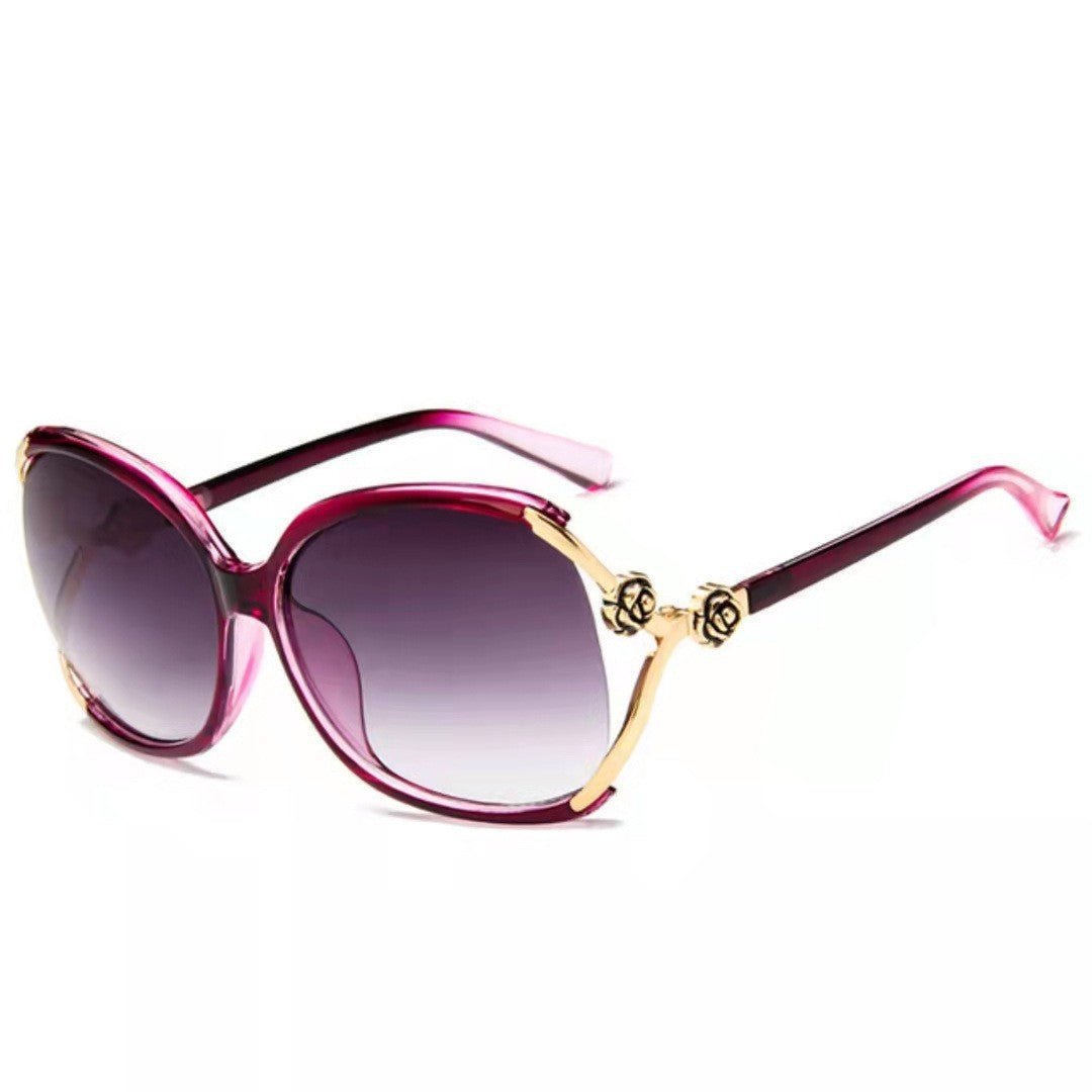Ladies elegant oversized sunglasses with golden accents Stornfield