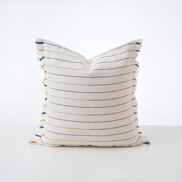 Structured square decorative pillow with crocheted trim and striped knit texture