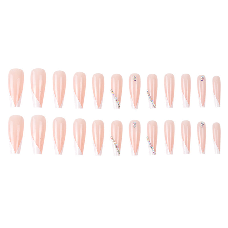 Glamorous Stiletto Nail Extensions with Rhinestone Accents Stornfield