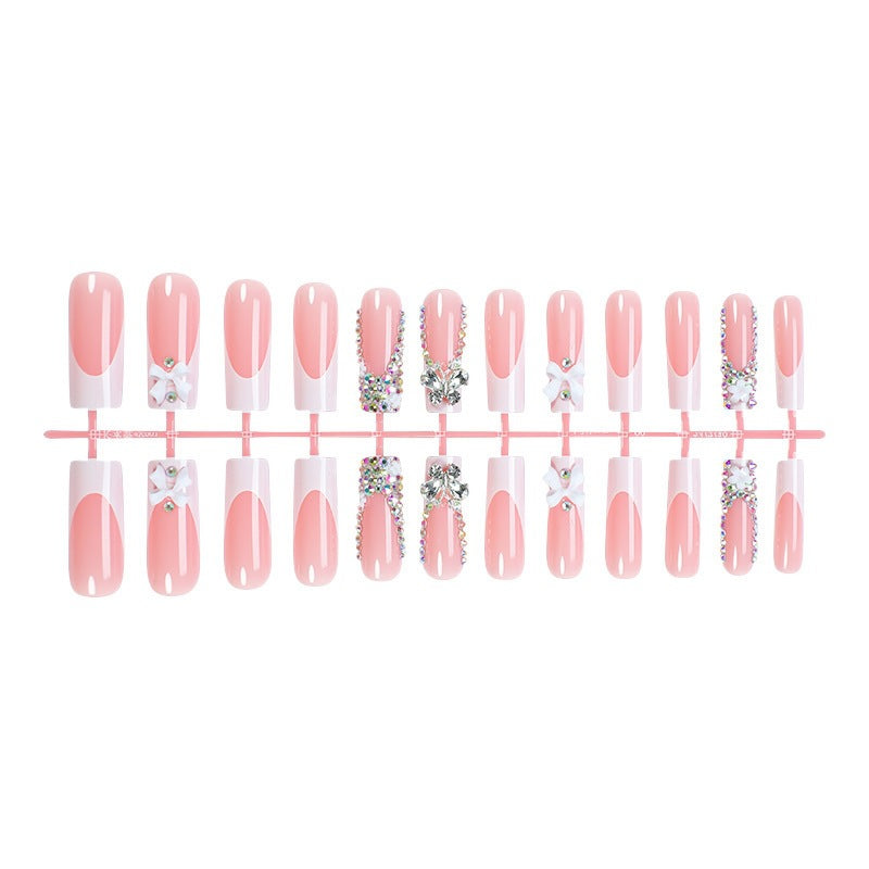 Acrylic nail set with extravagant 3D embellishments and sparkling accents Stornfield