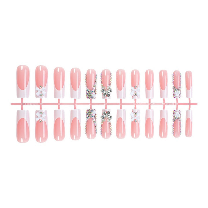 Acrylic nail set with extravagant 3D embellishments and sparkling accents Stornfield