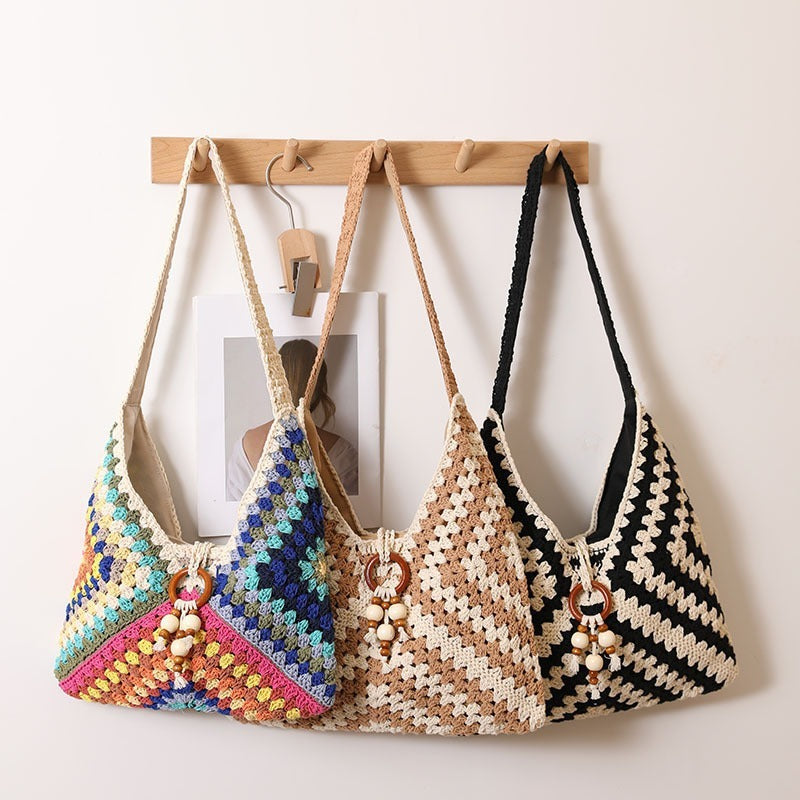 Handmade macrame shoulder bag with playful pendant Stornfield