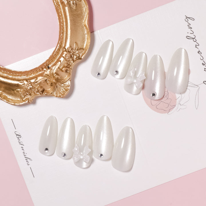 Elegant Stiletto-Shaped Press-On Nails with Decorative Bow Accents Stornfield