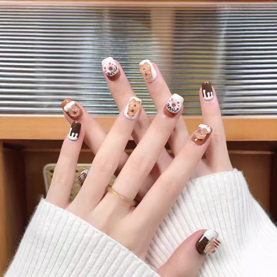 Playful art fake nails with animal motifs Stornfield