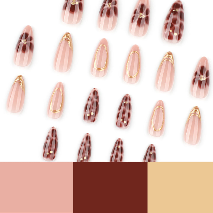 Elegant artificial nails with floral accents and gold details Stornfield