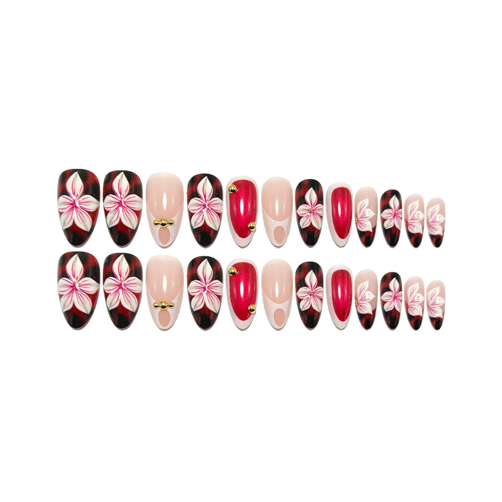 Artificial nails with floral 3D designs and elegant accents Stornfield