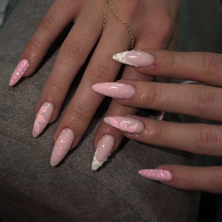 Artistic stiletto nails with elegant 3D decorations Stornfield
