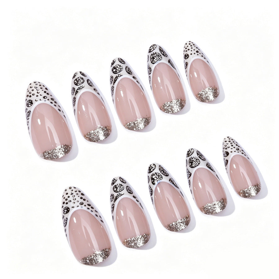Exquisite artificial nail creation with glitter and unique design Stornfield