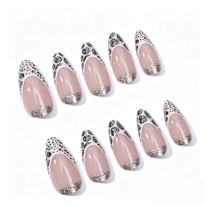 Exquisite artificial nail creation with glitter and unique design Stornfield