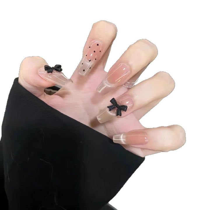 Artistic Long Stiletto Press-On Nails with Bow Accents Stornfield