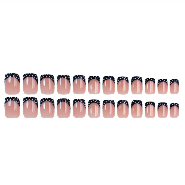 Artificial nail set with elegant black and white accents Stornfield