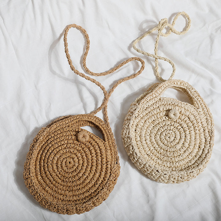 Handcrafted Round Wicker Bag with Elegant Closure Stornfield