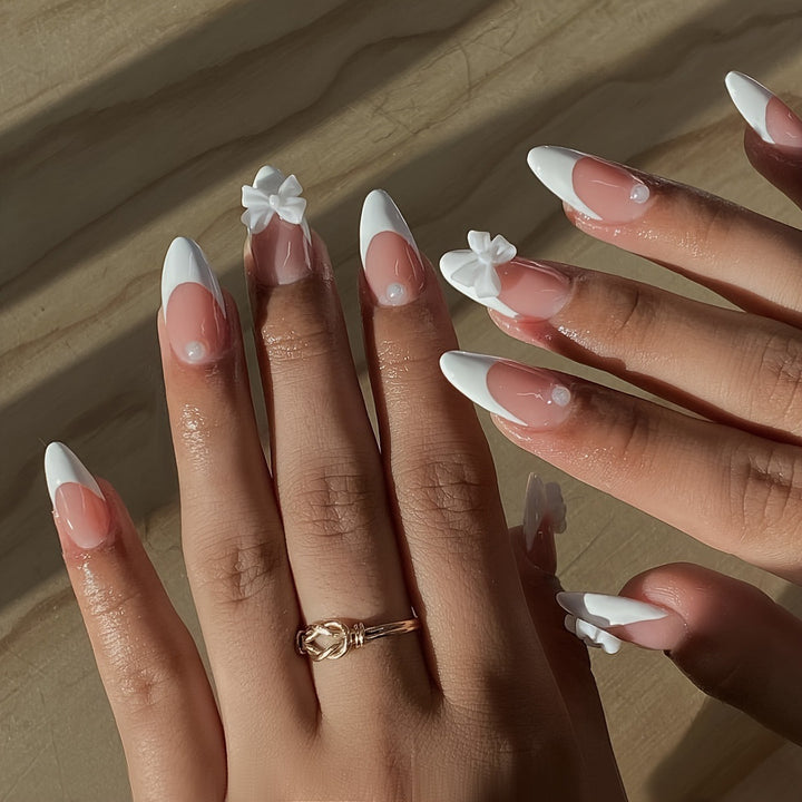 Acrylic nail set with elegant tips and floral accents Stornfield