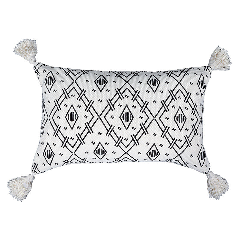 Square decorative cushion cover made of cotton blend with handwoven texture, geometric diamond print, and corner tassels