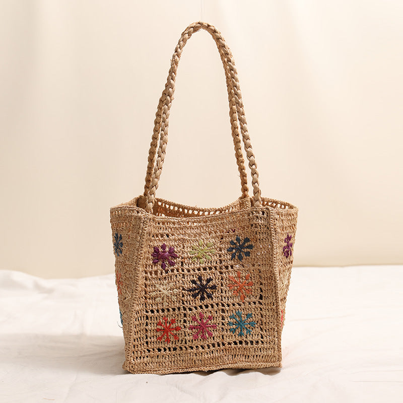 Handcrafted straw bag with colorful embroidery design Stornfield