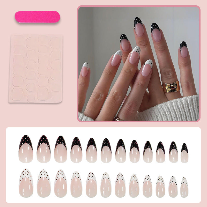 Artificial nail set with circular dots and modern tips Stornfield
