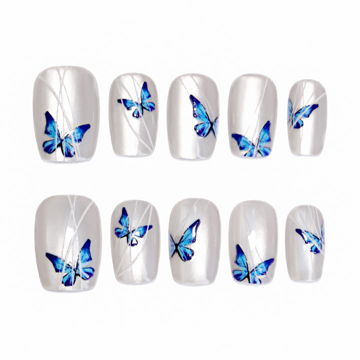 Creative nail extensions with intricate butterfly design Stornfield