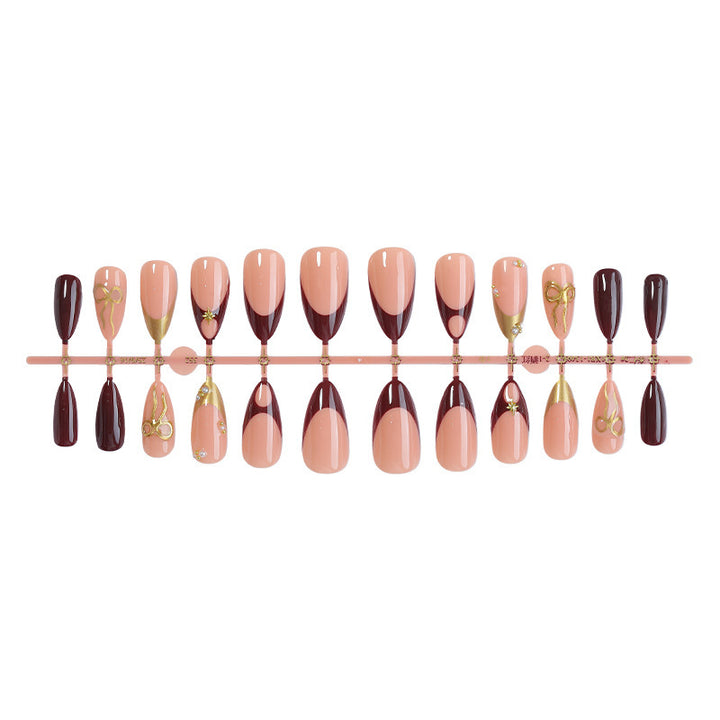 Artificial nail set with luxurious glossy design and creative accents Stornfield