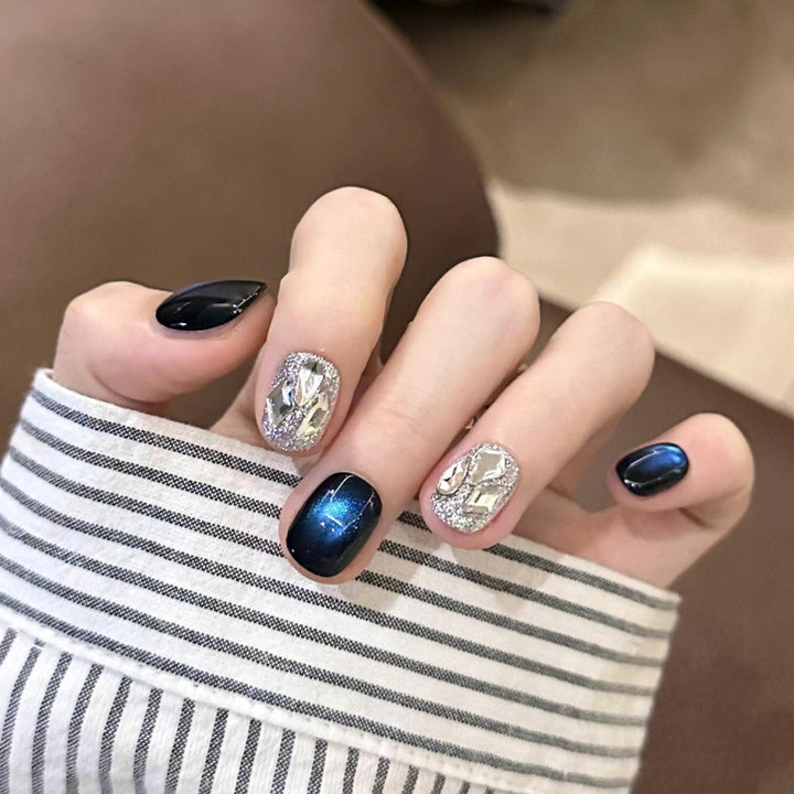Creative artificial nails with shimmering effects Stornfield
