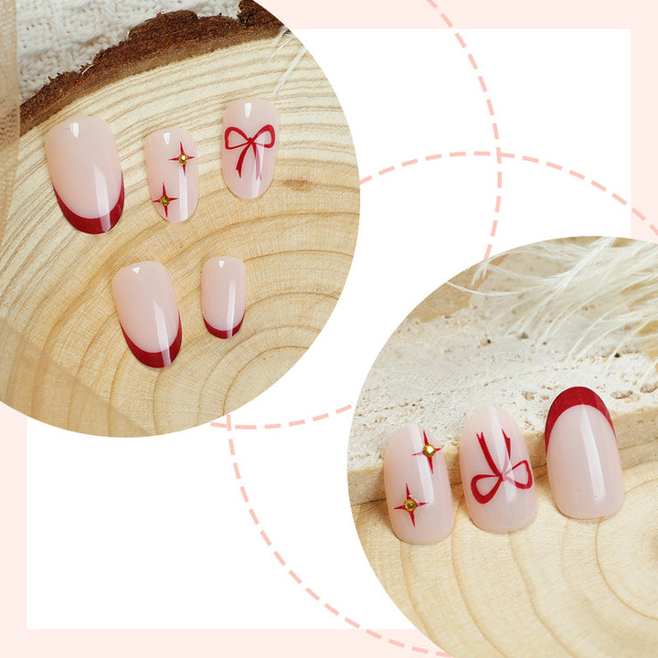 Acrylic nail set with elegant arch design and glitter effects Stornfield